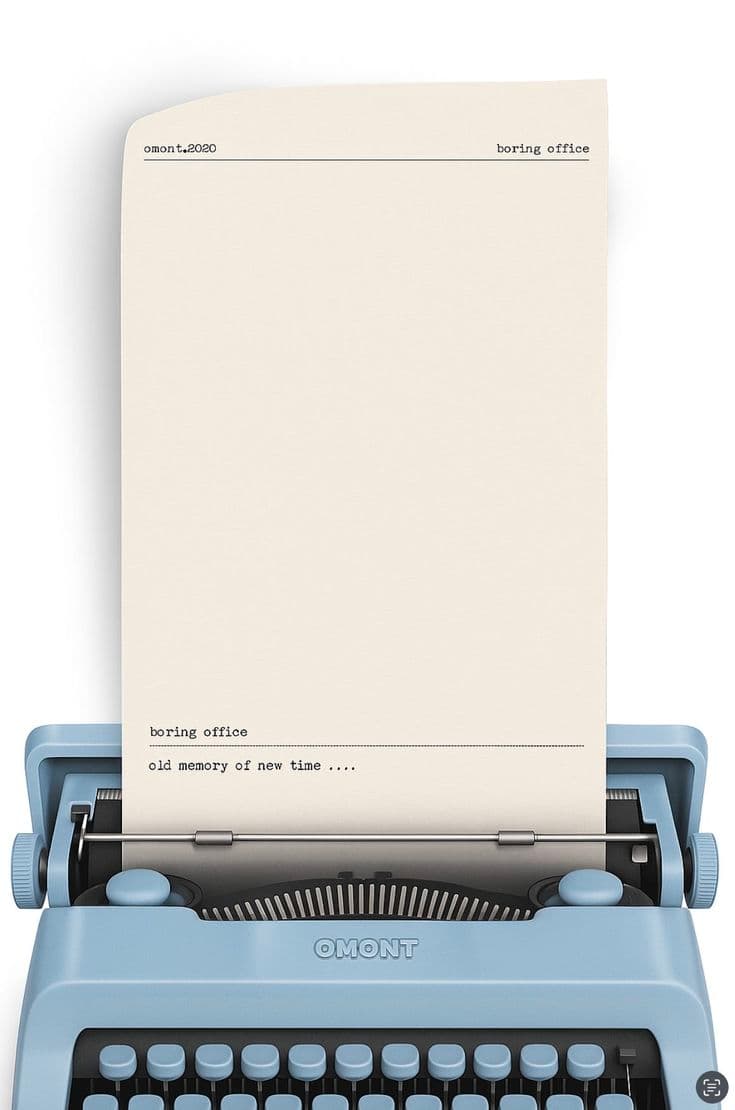 A baby-blue typewriter with a sheet of paper rolled up, ready for typing